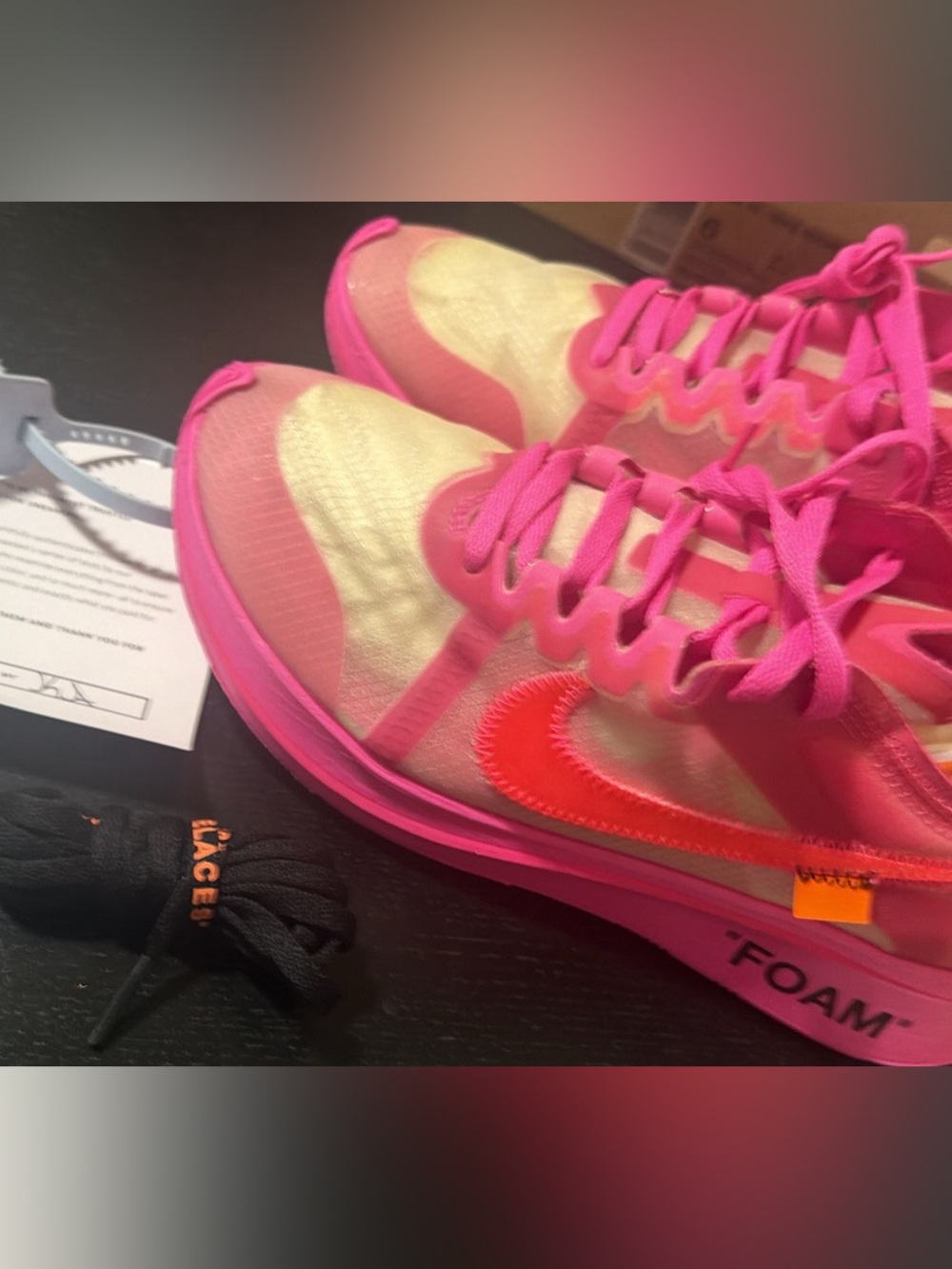 Nike Women’s Pink Sneakers with Neon Orange Swoosh